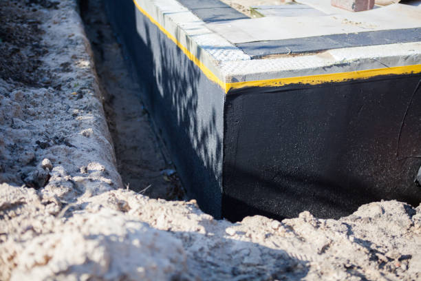 Professional Waterproofing technician working in Fork, MD